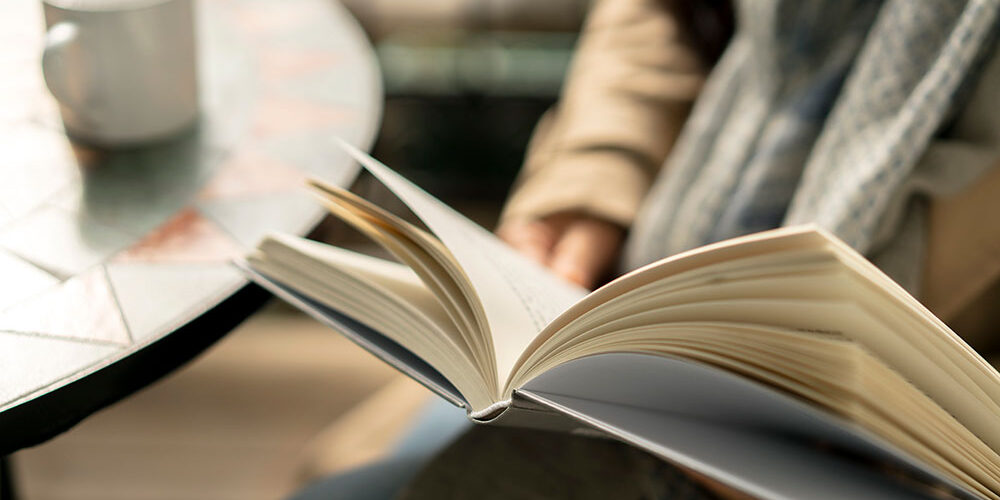 moneyplus reading book with coffee books about making money