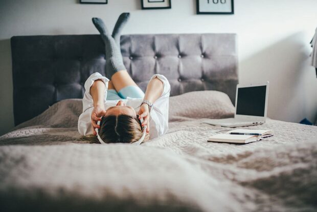 moneyplus woman listening to music songs about money