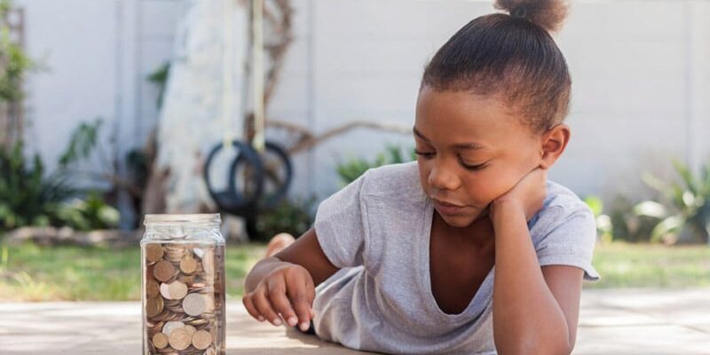 girl counting coins