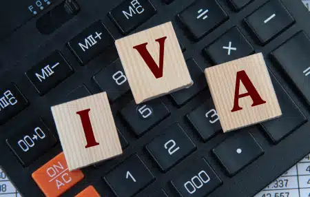 How-IVAs-are-Reshaping-Debt-Management-in-the-UK-feature An image of a computer keyboard with scrabble letters I, V, and A