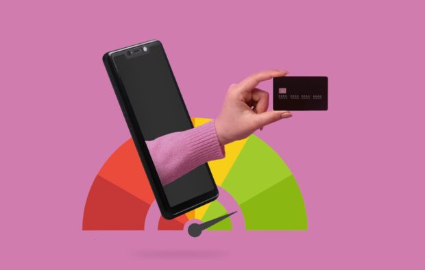 An image of a colourful credit score meter with an arm holding a credit card poking out of a mobile on a pink background.