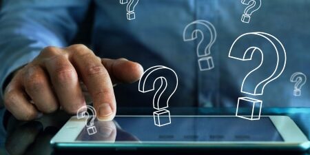 Image of someone scrolling through their iPad with lots of floating question marks.