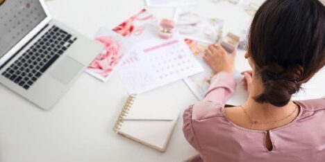 Planning a wedding in 2025 can feel like walking a tightrope between creating your dream day and protecting your financial future. With the cost of living continuing to rise and the price of organising a wedding following suit, more couples are looking for ways to celebrate without starting their marriage under a mountain of credit card or loan debt. However, in the current economic client, this can be much easier said than done. To help you plan the perfect day without breaking the bank, in this guide we explore some of the best ways of planning a wedding on a budget. (H2) What is the average wedding budget? According to a recent survey carried out by professional wedding planners hitched.co.uk, the average wedding in the UK cost £23,250 in 2024. This was 12% up on the average cost of a wedding just one year earlier, and a whopping 34% up since 2021. This average can be a little misleading however, with such a wide spectrum making up the figure. For example, it’s important to note that the same survey found that while 25% of couples spent over £30,000 (and 10% over £40,000), 20% were far more thrifty, only spending between £10,000 - £15,000. (H2) Why do people get into debt over weddings? So, why do so many couples find themselves in debt after their big day? Well, it tends to be down to a mix of factors. First and foremost, costs tend to spiral because weddings are highly emotional occasions, and it's easy to get swept up in the romance of it all, chasing a day in which everything is picture perfect. This can lead to overspending, as couples prioritise creating a magical experience, sometimes without fully considering the financial implications. On top of this, there's also a significant amount of social pressure on couples when it comes to wedding planning nowadays. Many couples feel the need to impress family and friends. And when this is combined with the ‘ideal wedding’ presented on social media and glossy wedding magazines - neither of which exactly promote budget-friendly celebrations - it creates a perfect storm where couples feel compelled to spend far more than they can comfortably afford, often leading them straight into debt. Unexpected expenses are another common pitfall. Even the most meticulous planners can encounter unforeseen costs, such as final alterations to the dress or last-minute unexpected guests. These surprise expenses can throw even the most carefully crafted budget off track, leading to further debt. Finally, the easy availability of credit plays a role to fund weddings and can also fuel the issue. In order to put on the wedding of their dreams, many couples resort to using credit cards or taking out personal loans to finance their weddings. While this may seem like a convenient solution in the short term, it can lead to long-term financial problems. The interest accrued on these debts can be substantial, making it difficult to repay and creating a stressful start to married life. Starting a marriage burdened by debt can impact future financial decisions, such as buying a house or starting a family, and can put a strain on the relationship itself. (H2) How to do a wedding on a budget? Planning a wedding on a budget is doable, but it can be hard work. It requires careful planning, prioritisation, and a willingness to make some compromises. But the reward - starting your married life financially secure - is well worth the effort. Below we provide our top tips for planning a perfect wedding without breaking the bank. (H3) Set a realistic budget This is the most crucial step to planning a wedding. Before you start organising anything, sit down with your partner and honestly assess your finances. From this point, you can determine how much you can realistically afford to spend without going into unmanageable debt. Just be sure to remember to be realistic about your income and expenses, and factor in any existing debts you may be dealing with - both as a couple and independently. Once you have a figure in mind, stick to it! As discussed above, it can be easy to get carried away, but staying within your budget is key to avoiding financial stress. (H3) Limit the guest list One of the biggest wedding expenses is catering. The more guests you invite, the more you’ll spend on food, drinks, and potentially even venue hire. If you are planning a wedding on a tight budget, think about maybe having a smaller, more intimate celebration with your closest family and friends. This not only saves money but can also create a more personal and meaningful experience. (H3) Choose an affordable venue Typically, venue hire makes up the biggest expense when planning a wedding. Indeed, as a general rule, you should be earmarking around half of your total wedding budget for the venue rental and dining services. However, by securing a great value venue, overall costs can be significantly reduced. With this in mind, think about less traditional venues, such as community halls, local parks, or even your own home. These options can be much cheaper than traditional wedding venues like hotels. If you have your heart set on a dedicated wedding venue, consider off-peak times or days of the week, as these are often offered at discounted rates. (H3) DIY invitations and decorations Instead of hiring a professional, consider creating your own invitations and decorations. There are countless DIY tutorials available online, and this can be a fun and creative way to personalise your wedding while saving money. Think about using affordable materials like recycled paper, wildflowers, and homemade decorations and skip the professional decoration hire. (H3) Think about pre-loved/vintage Wedding outfits, especially dresses, can be incredibly expensive. Exploring second-hand or vintage options can be a fantastic way to save money while also finding something unique and potentially even more special. There are many online marketplaces and dedicated vintage shops where you can find beautiful dresses, suits, and accessories at a fraction of the cost of buying new. Plus, it's a more sustainable choice! (H3) Rethink your priorities Decide what elements of your wedding are most important to you and your partner. Are you passionate about having a live band? Or is the food the most important aspect? Once you’ve identified your priorities, allocate your budget accordingly. This exercise will undoubtedly require compromise from both you and your partner, and you might not be able to have everything you’ve ever dreamed of, but ultimately it will help you make informed decisions about where to spend and where to save. By being flexible and willing to adjust your expectations, you can still have a beautiful and memorable wedding without breaking the bank. (H3) Don't be afraid to ask for help Don't be afraid to ask friends and family for help. They may have skills or resources that you can utilise, such as photography, baking, or even just lending a hand with decorations! Although you may find it awkward asking for help, you might be surprised how many of your friends are happy to contribute to a couple's special day. (H3) Track your spending Finally, keep track of all your wedding expenses. This sounds obvious, but you would be amazed how much this simple task can save in the form of accidental overspending and help you avoid any surprises. Use a spreadsheet or a wedding planning app to monitor your spending and make sure you’re not overspending in any area. Remember - your wedding should be about celebrating the beginning of your marriage, not the end of your financial security. Focus on creating moments and memories rather than checking off a list of traditional must-haves. With careful planning and creative thinking, you can create a beautiful celebration without compromising your financial future