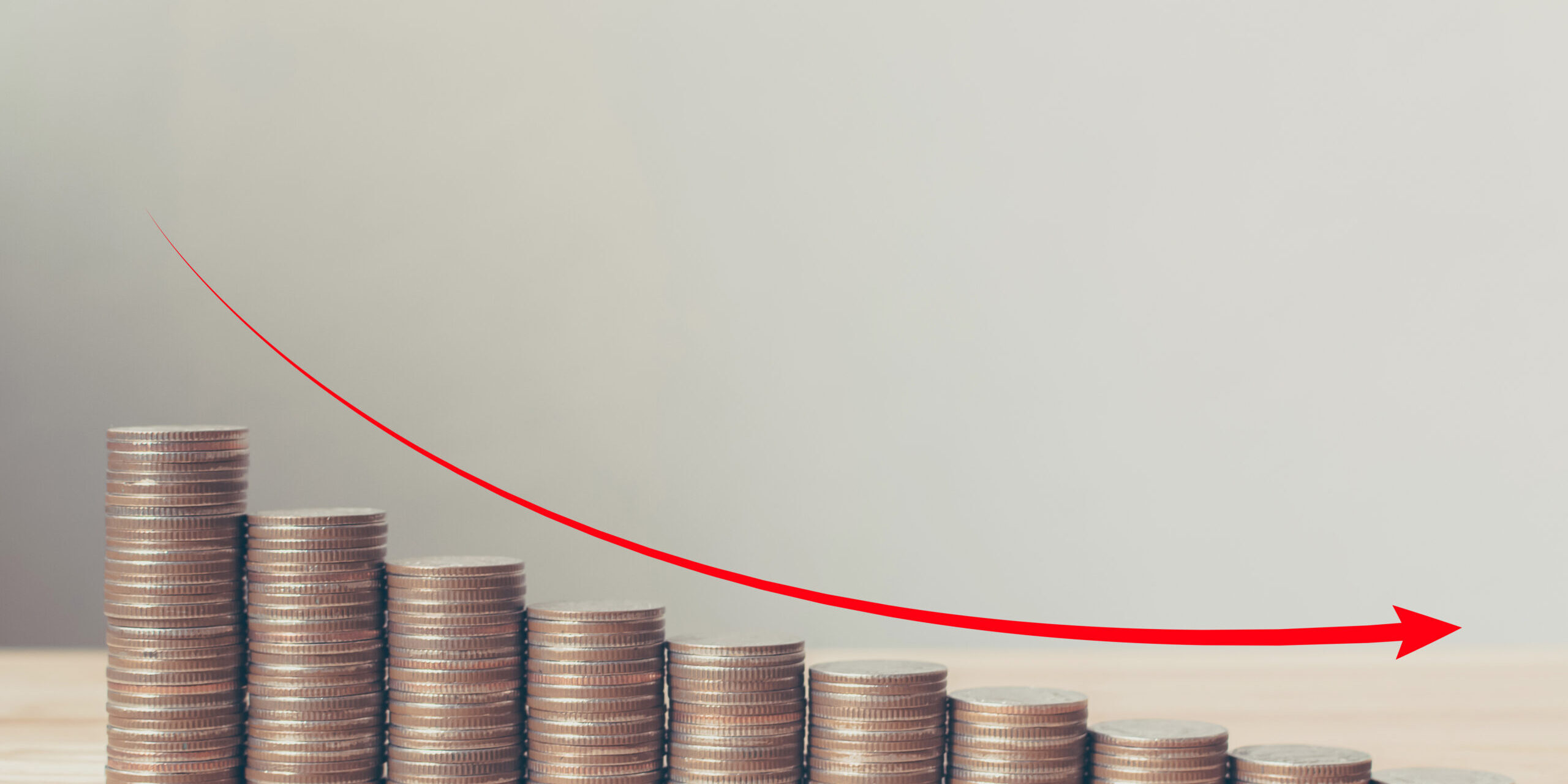 A stack of coins stepping down